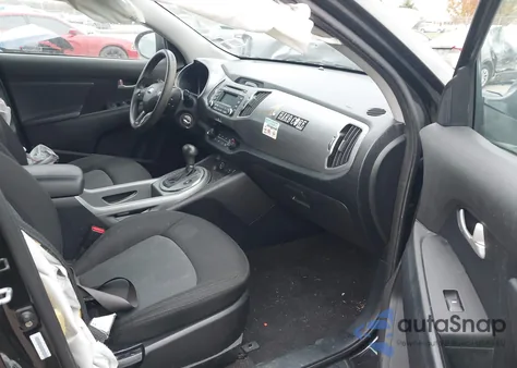 2015 Kia Sportage Lx z USA, uszkodzony, nr VIN KNDPBCAC2F7754391